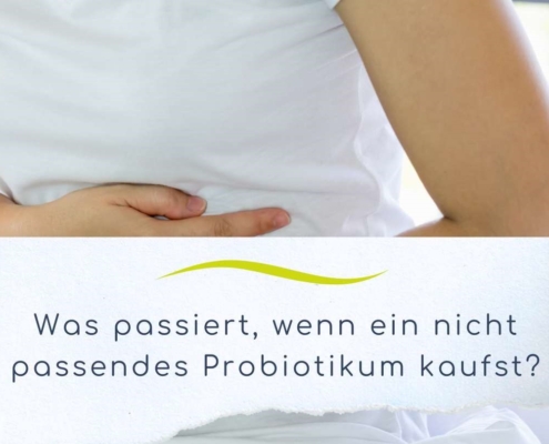 Frau hält sich den Bauch