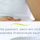 Frau hält sich den Bauch